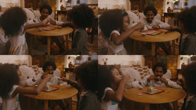 一位父亲和他的孩子在家里举行茶会的4k视频片段