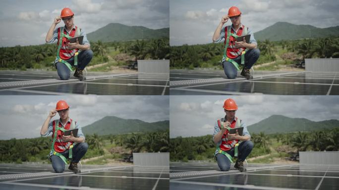 男性工程师或技术人员或承包商的肖像，穿着安全设备，防止从高处坠落，检查太阳能发电厂的工作系统和维护太
