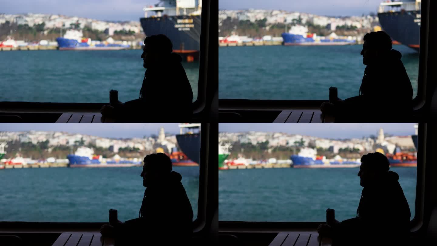 在船上旅行的人的剪影，站在移动的渡轮上的年轻人思考并环顾四周，从游轮上欣赏令人惊叹的景色，在船的密闭