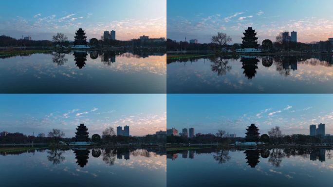 唯美梦幻天空平静湖面夕阳水天一色实拍视频