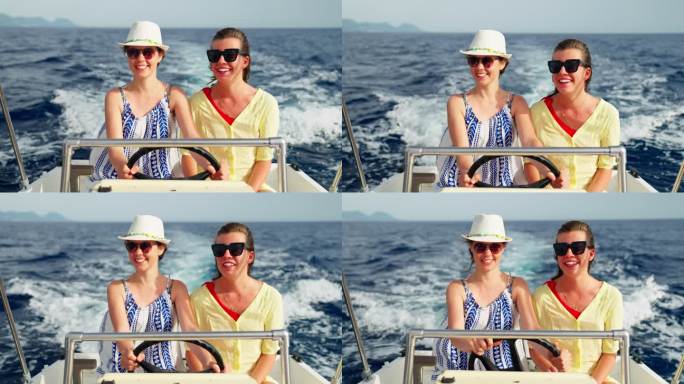 女性朋友在梦幻假期中享受快艇之旅。自然的微笑