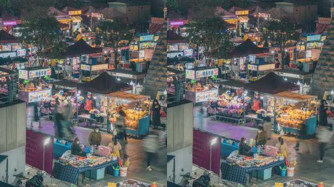 柳州风情港夜市美食街摊点和游客延时摄影