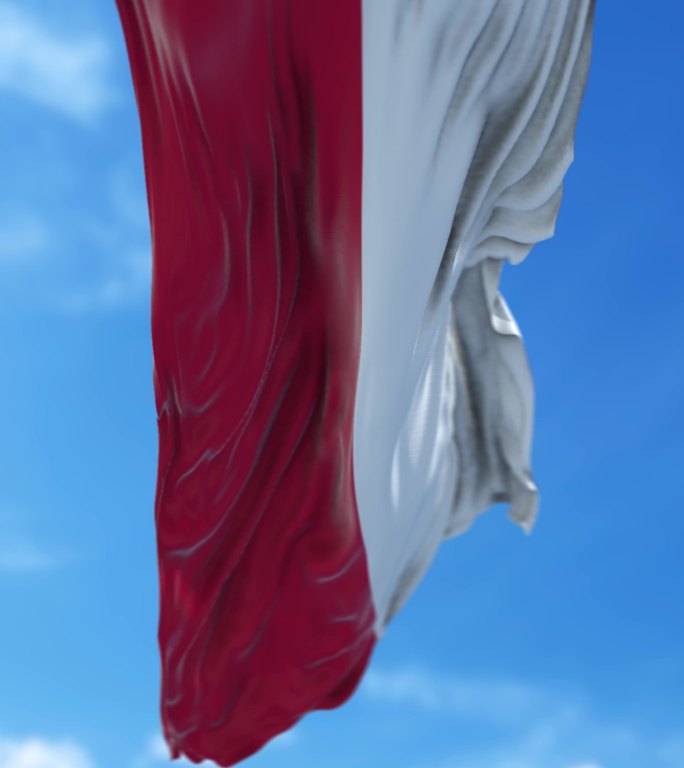 垂直波兰国旗在4K分辨率的蓝天下缓缓飘扬