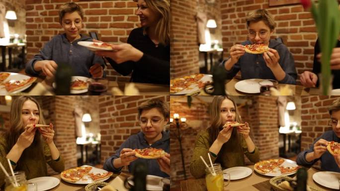 一家人享用披萨作为午餐