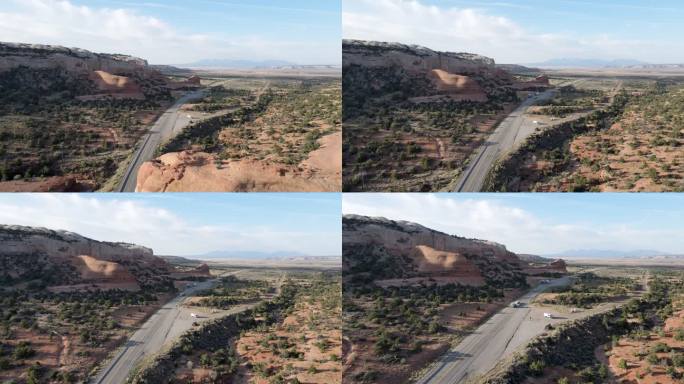 下午晚些时候，犹他州南部靠近摩押州的红岩砂岩沙漠中，无人驾驶18轮半卡车在两车道公路上行驶