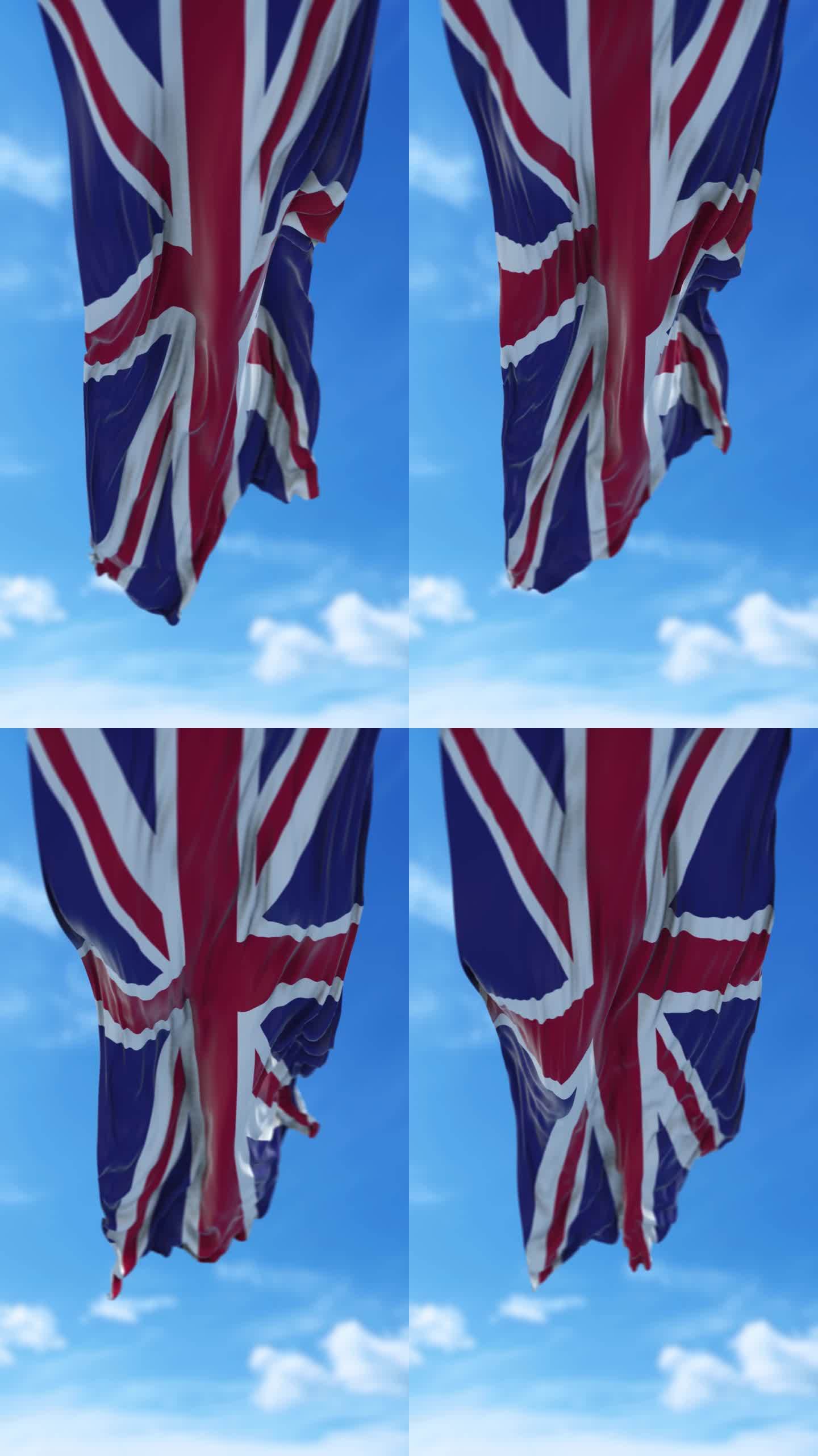 垂直英国国旗在4K分辨率的蓝天下缓缓飘扬