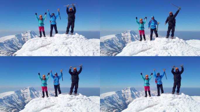 一群登山者在山顶庆祝成功