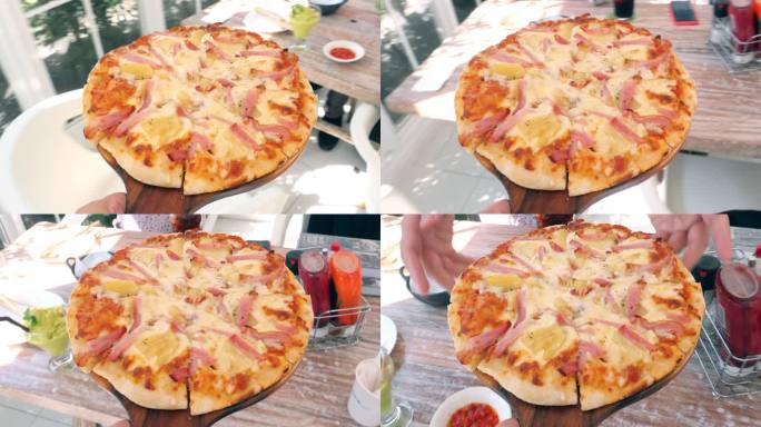 奶酪日奶酪芝士披萨端上来国外餐桌