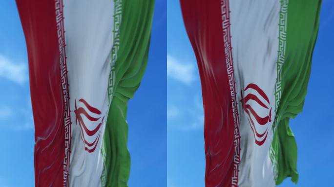 垂直的伊朗国旗在4K分辨率的蓝天下缓缓飘扬