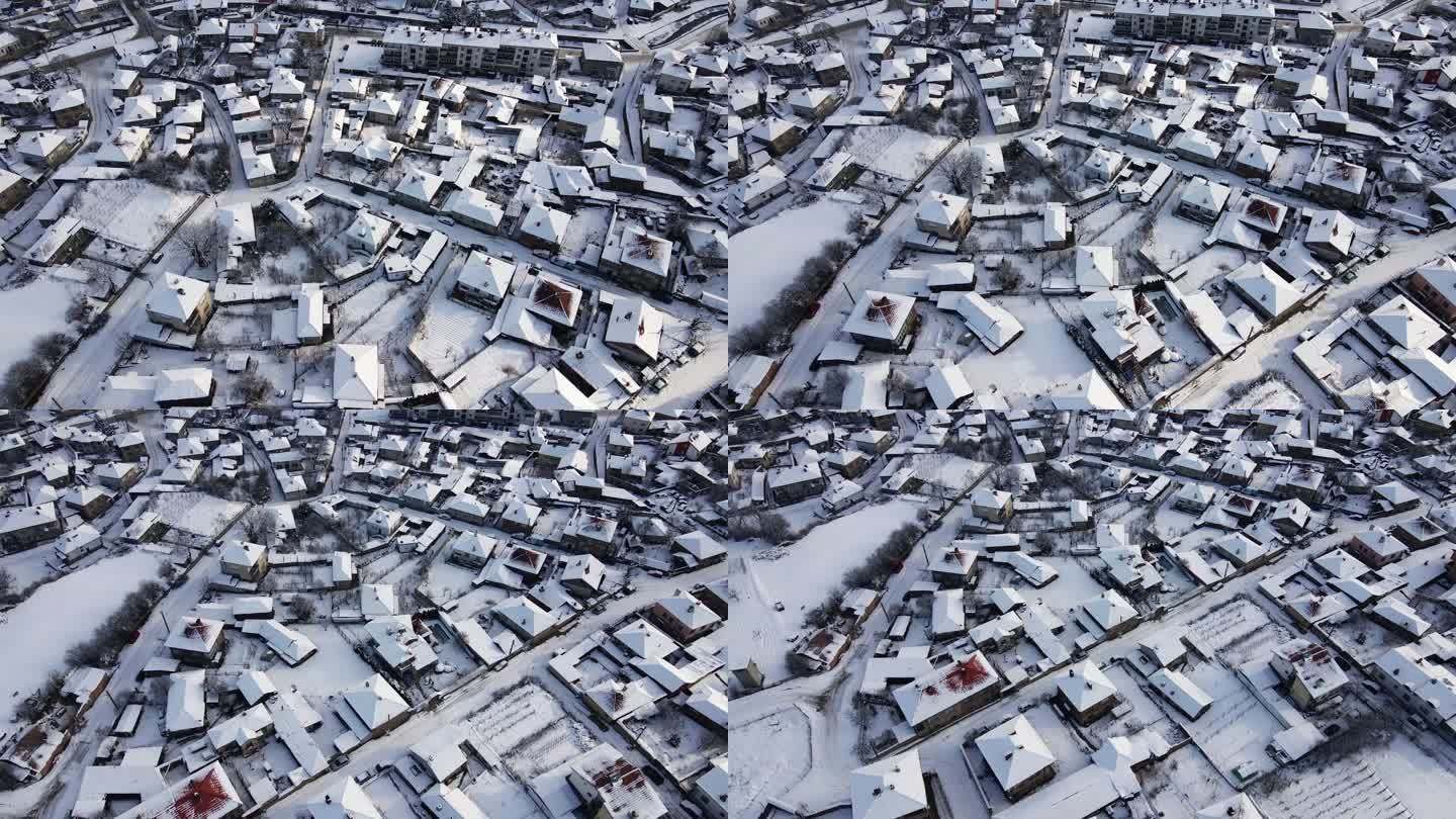 冬季鸟瞰雪山小镇。
