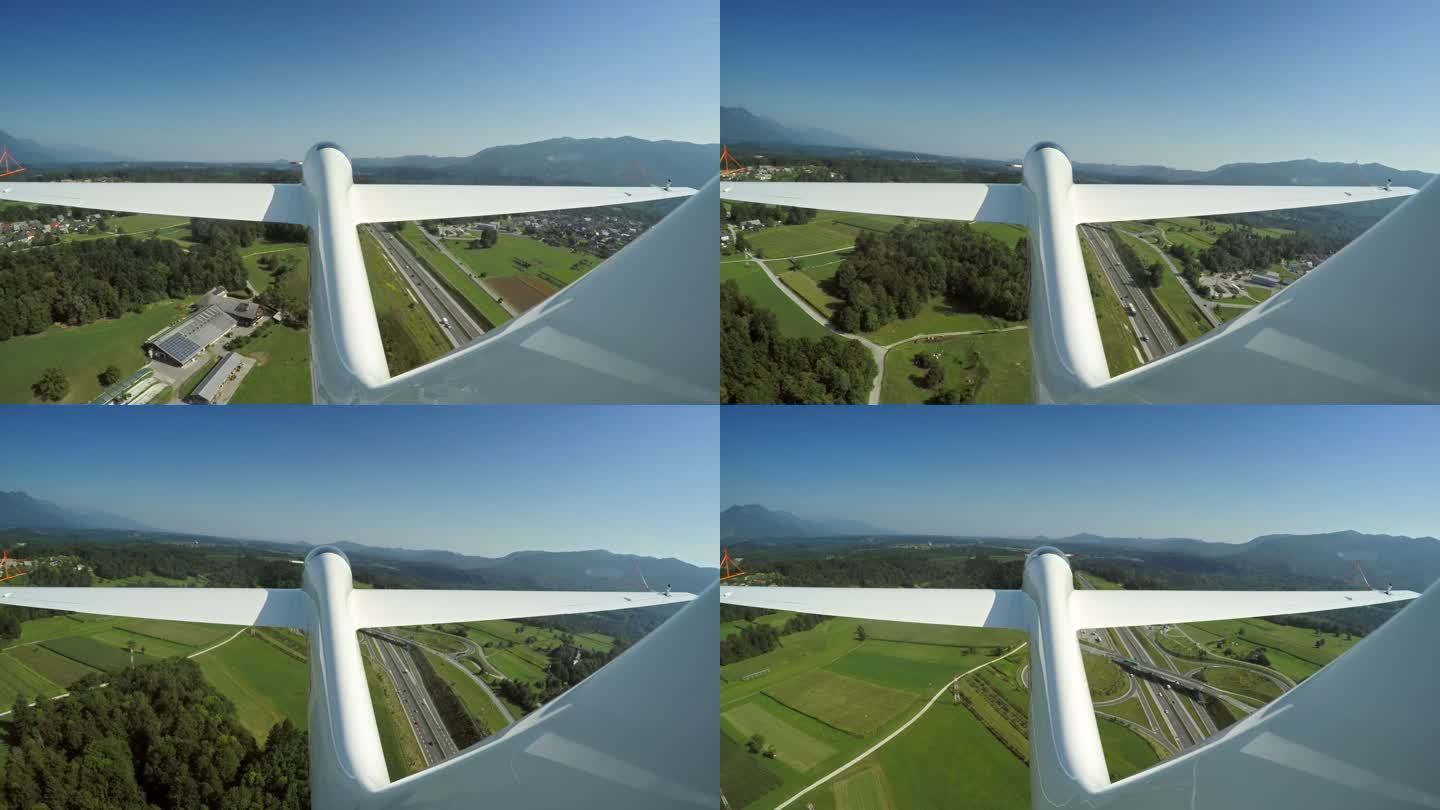 LD滑翔机在绿色景观上方的空中被拖曳