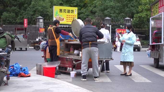 路口的葱花油饼地摊