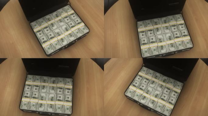 一个公文包里的一叠100美元钞票4K股票视频