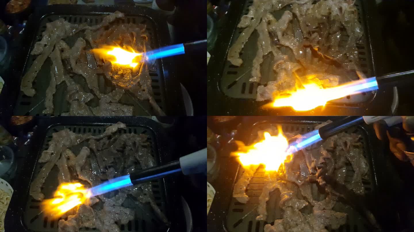在camfire，厨师手持厨房喷灯在Wagyu牛肉表面燃烧的慢镜头，一名男子在篝火上烧肉的特写镜头