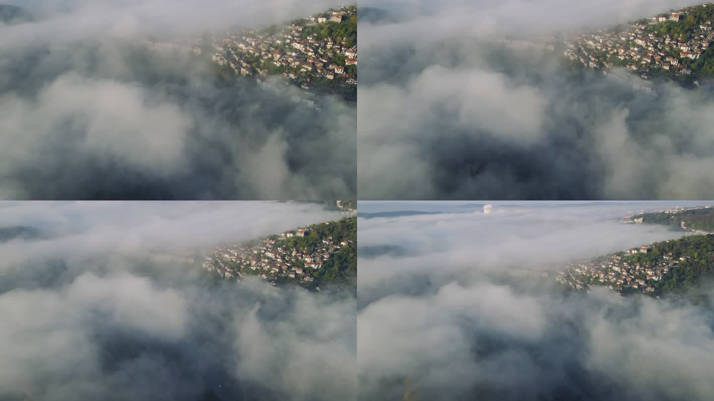 秋雾下日出时的可持续城市鸟瞰图。城市发展顺利，公园和自然空间众多。Veliko Tarnovo。