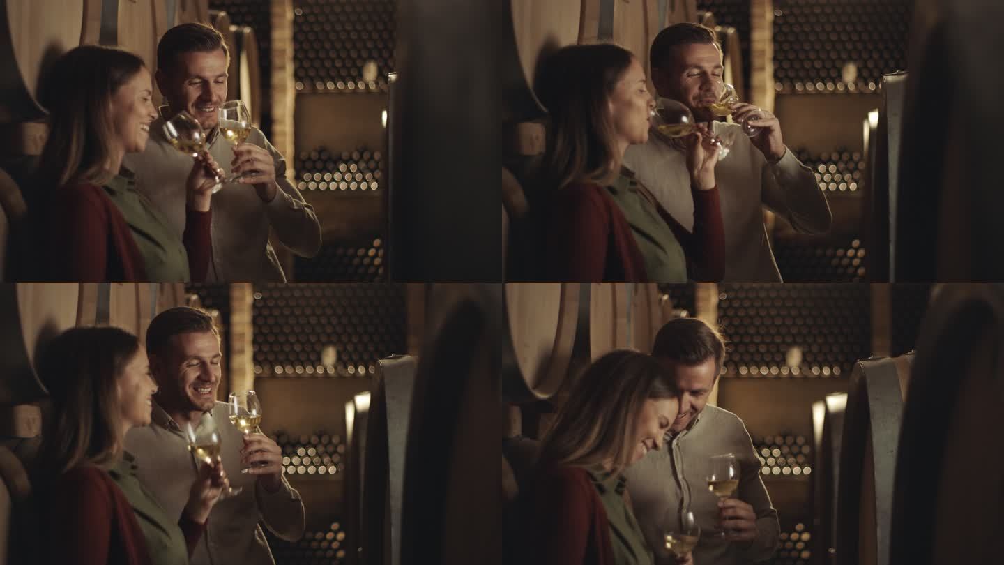 酒窖里的浪漫情侣品尝葡萄酒