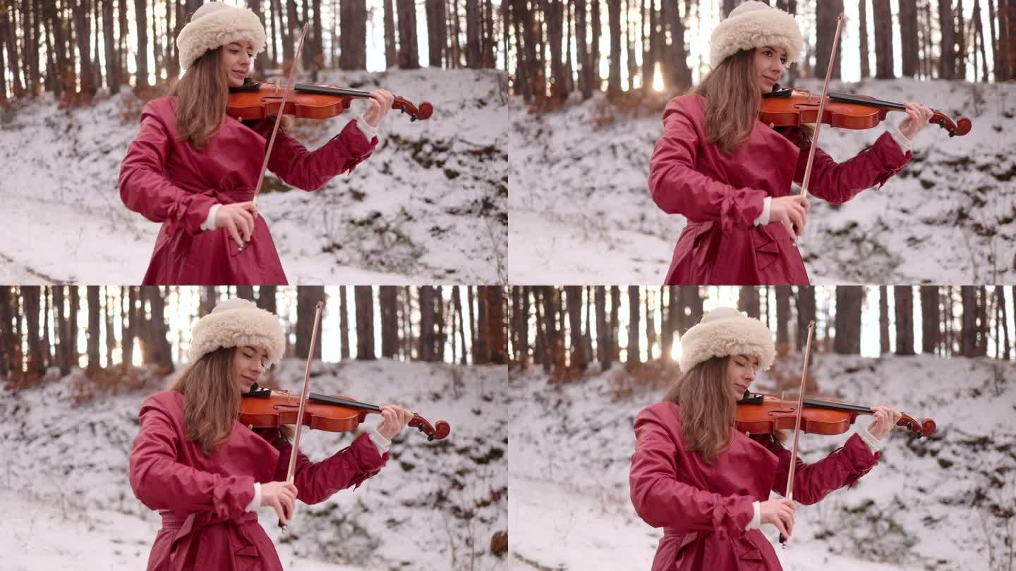 在雪地上拉小提琴的女人