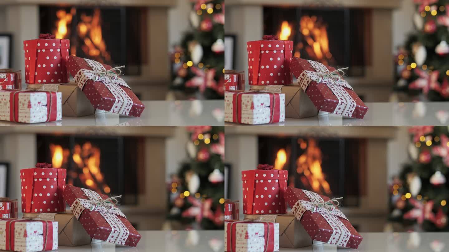 壁炉旁圣诞礼物的幻灯片，圣诞背景，美丽的圣诞概念。