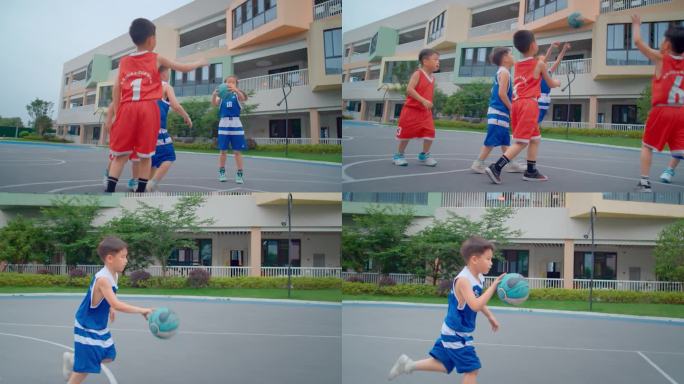 小学生朋友打篮球小孩子玩耍打篮球小学操场