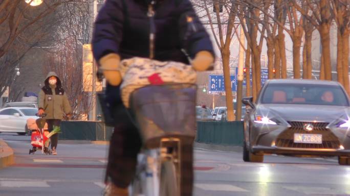 城市夕阳上班街道骑行忙忙碌碌的人都市生活