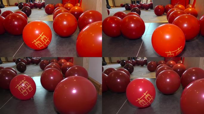 地上的红色喜字气球