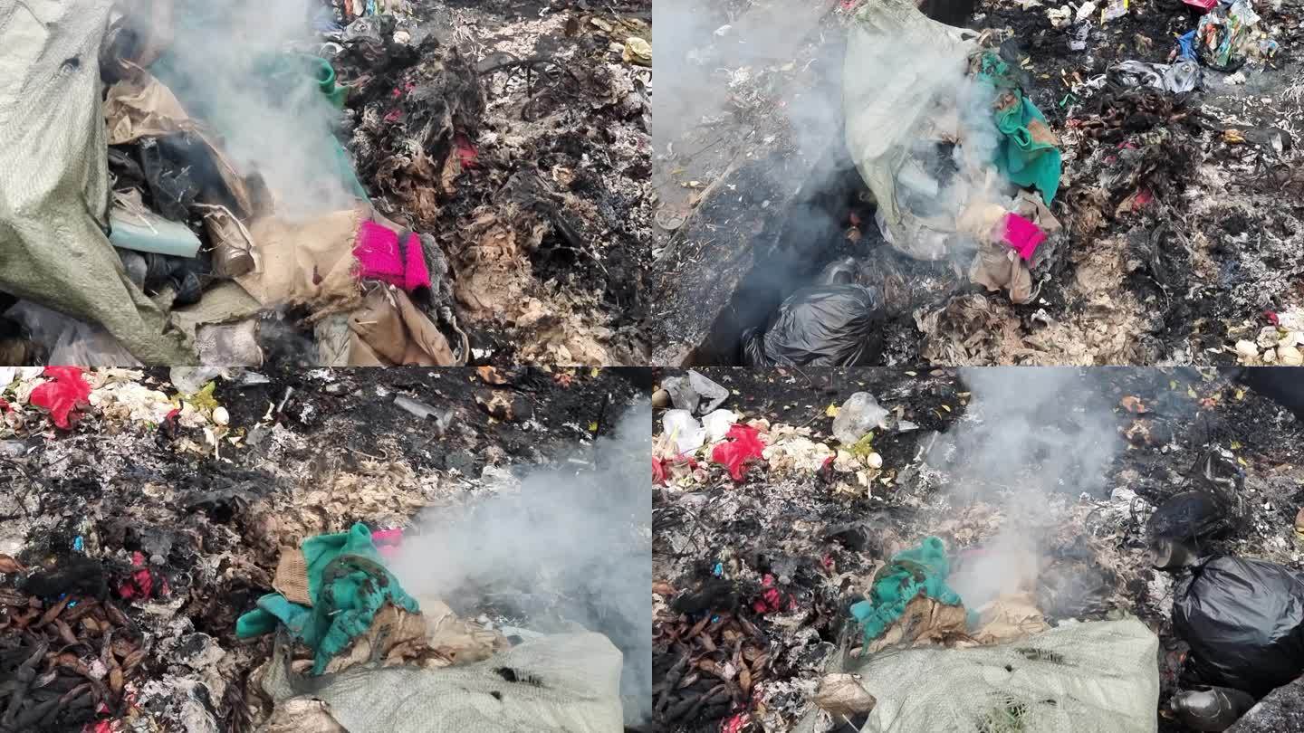 垃圾处理着火冒烟燃烧的垃圾堆农村污染环境
