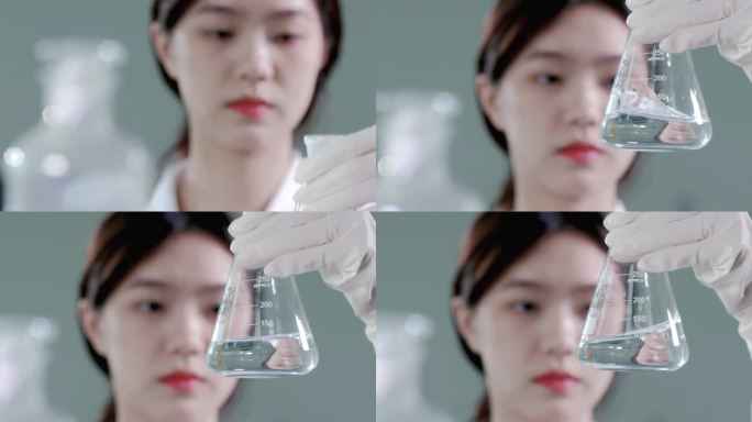 【4K】美女观察玻璃量杯做实验