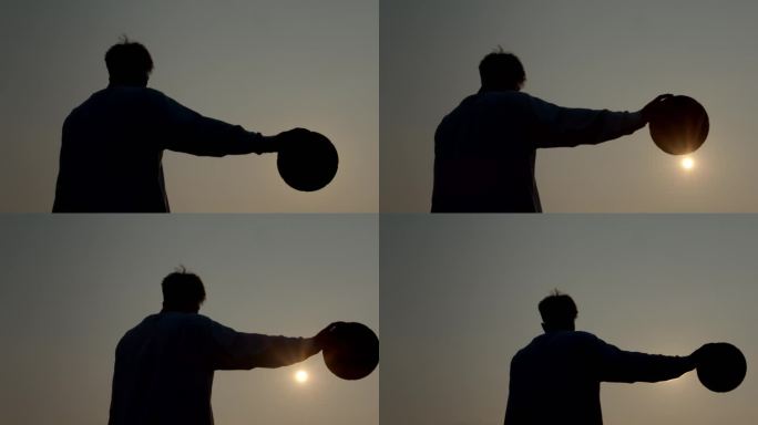 【4K】男子单手抓篮球逆光
