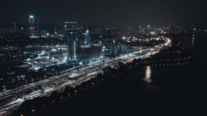 航拍深圳湾超级总部建设进展夜景