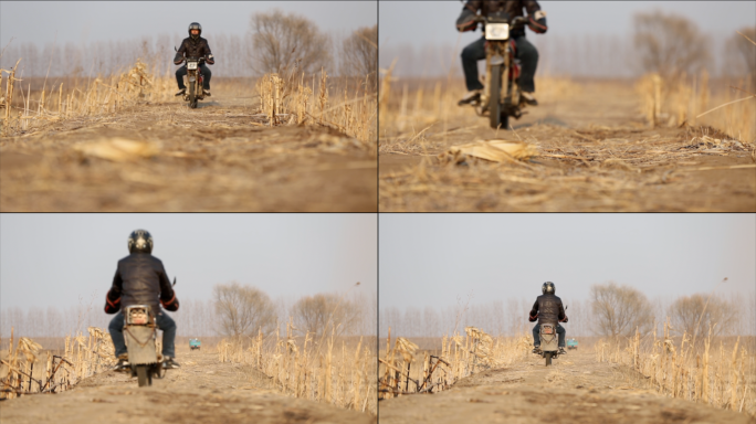 农民骑摩托车经过一段土路