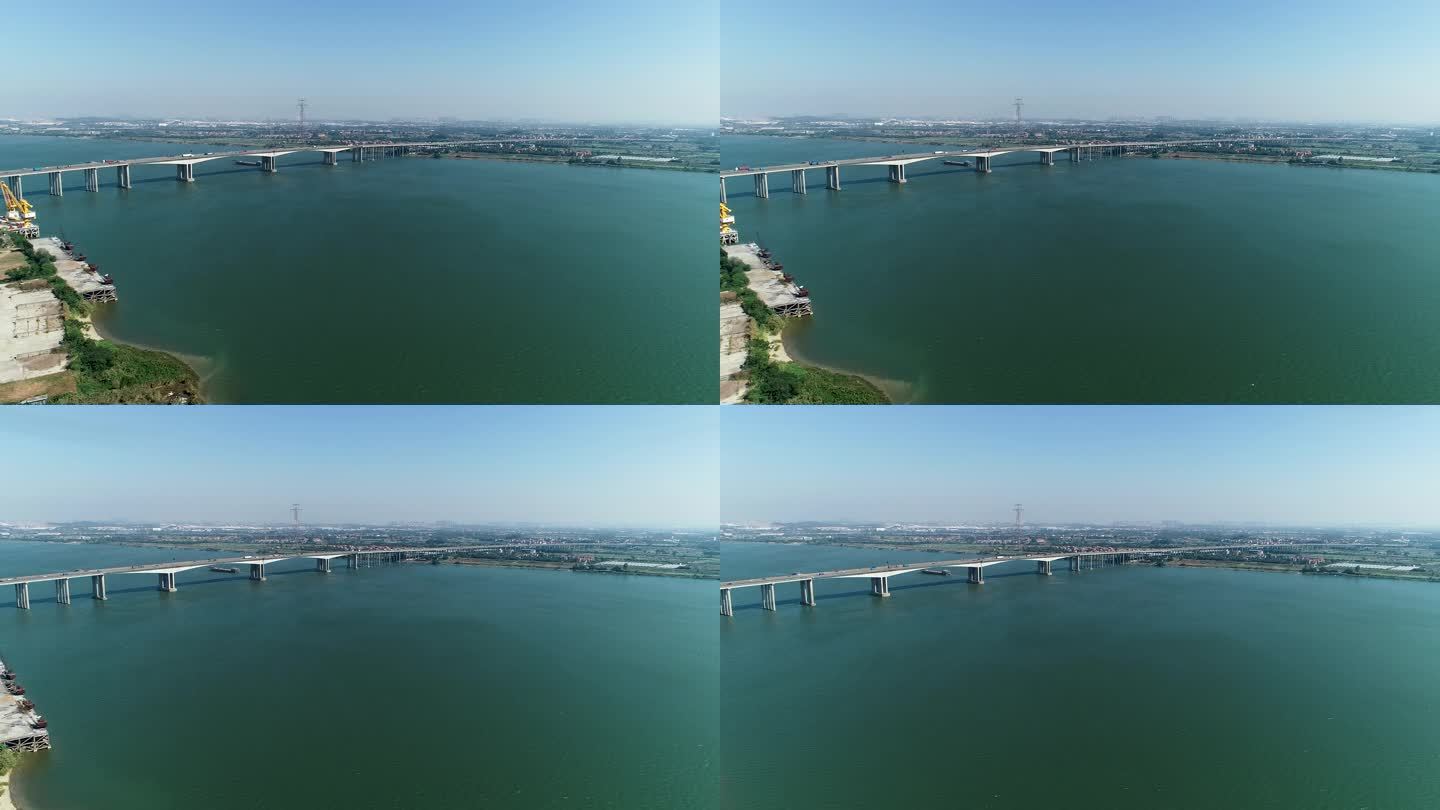 航拍跨江大桥 货轮过桥 晴朗 江面水面