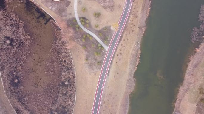 原创无人机拍摄河流公园一角风车