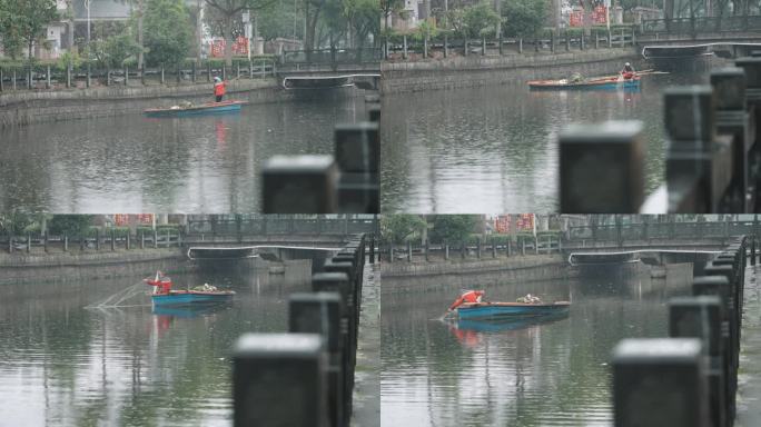 雨天河道捕鱼清理垃圾