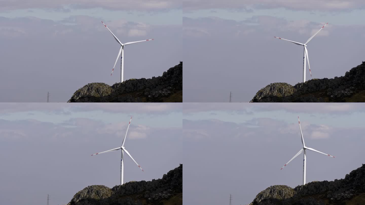 云南红土地丘陵上的风力发电大风车