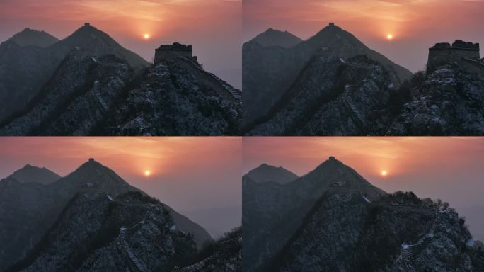 航拍震撼的雪后长城日出美景