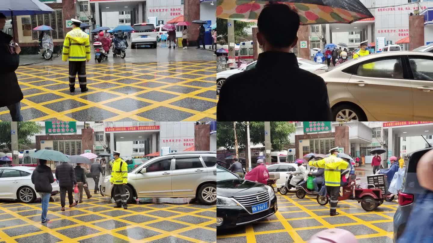 交警冒雨执勤雨中行人警察交警雨中执勤