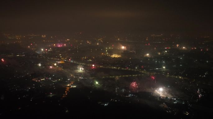 春节城市烟花燃放烟火夜晚山顶看烟花航拍