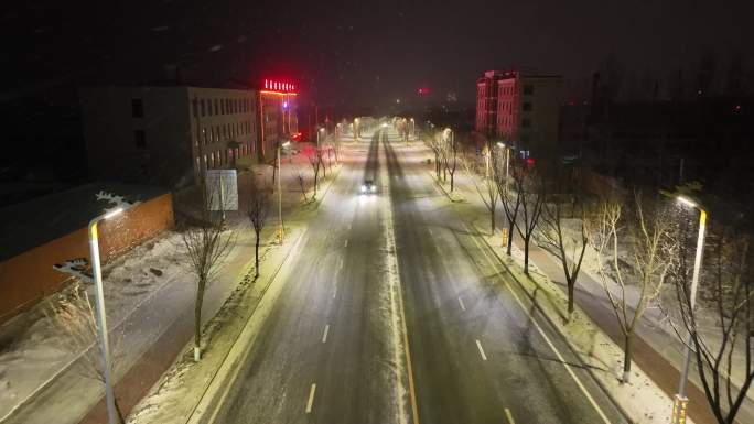 航拍大年三十夜晚大雪