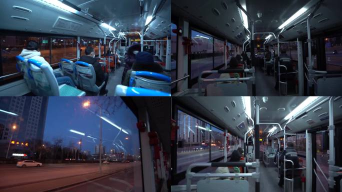 夜晚北京的公交车玩手机