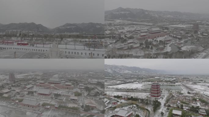 航拍西安周至赵公明财神庙环绕雪景秦岭平原