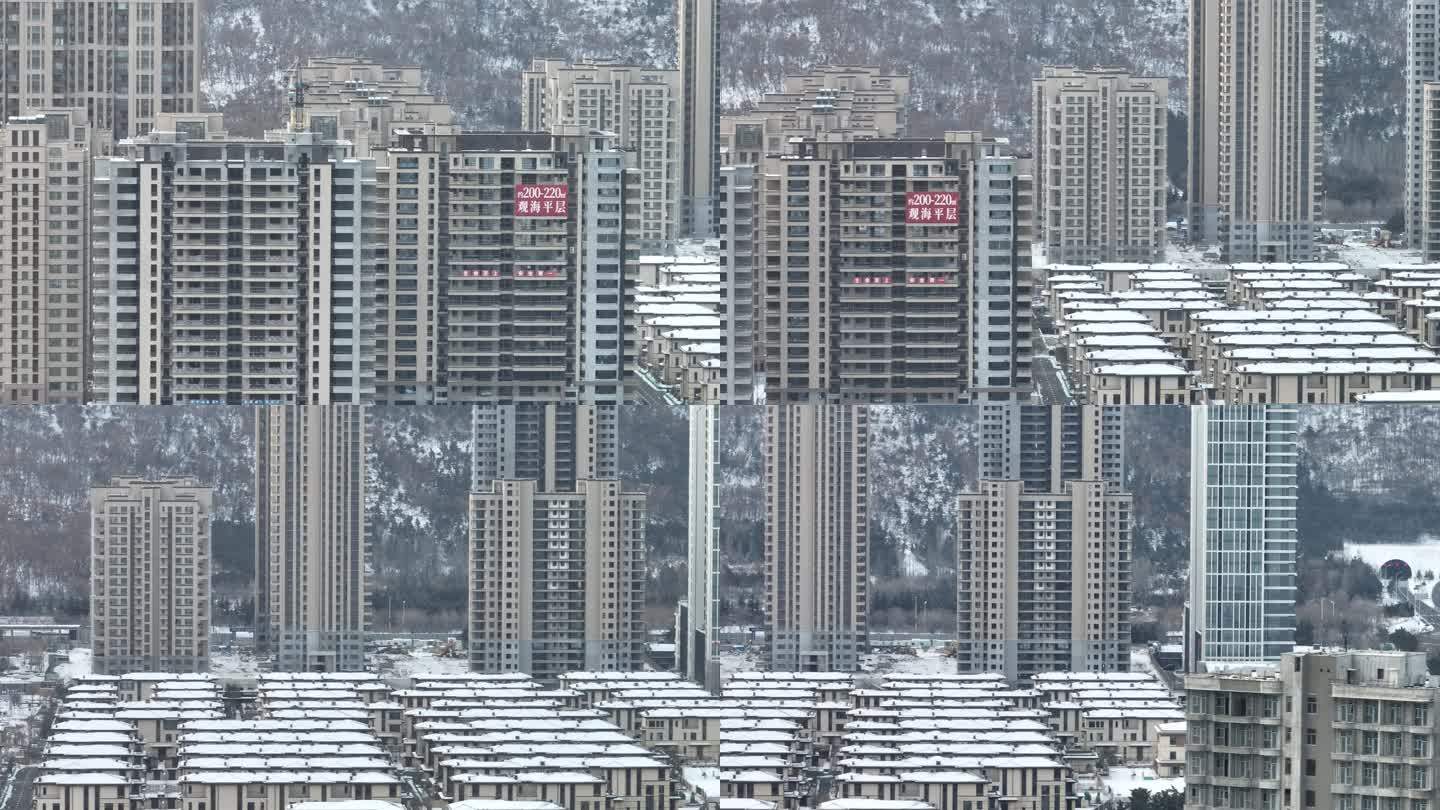 长焦航拍环绕雪后威高七彩城高楼