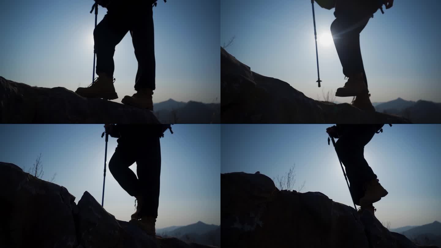 逆光山顶行走登山脚步特写攀登顶峰户外探险