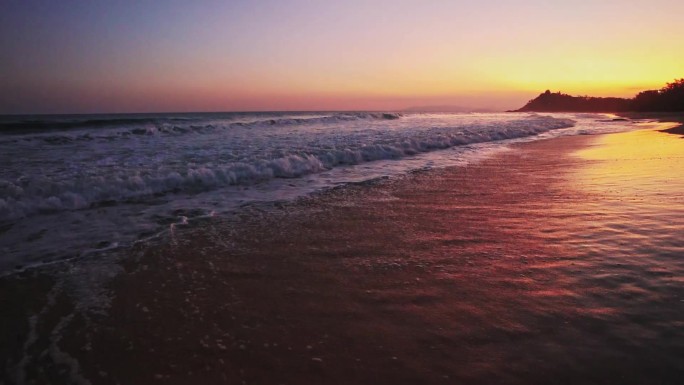 日落海浪海岸沙滩晚霞