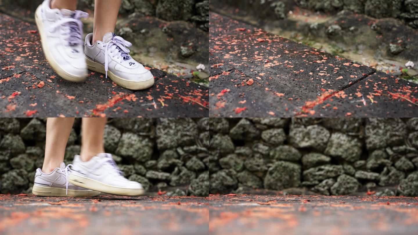 女孩穿着运动鞋走在路上前行行走步伐游玩