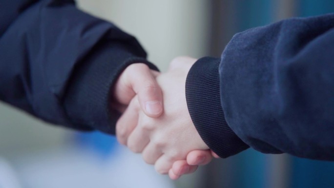 握手言和握手特写达成合作协议合作伙伴沟通