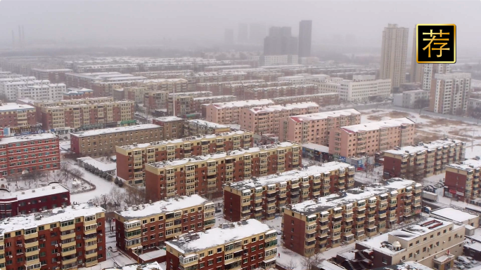 航拍雪后楼群 冬季城市高楼住宅雪后景色