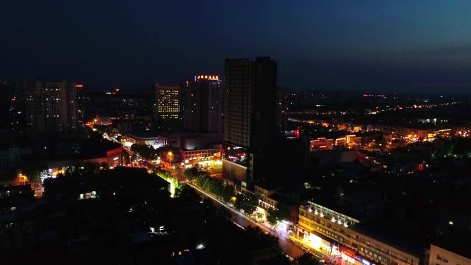 航拍淮北濉溪县城区傍晚夜景密度