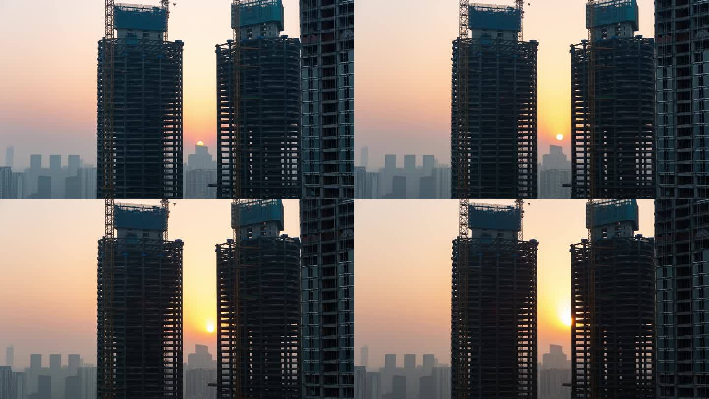 城市日出高层建筑工地红太阳升起延时