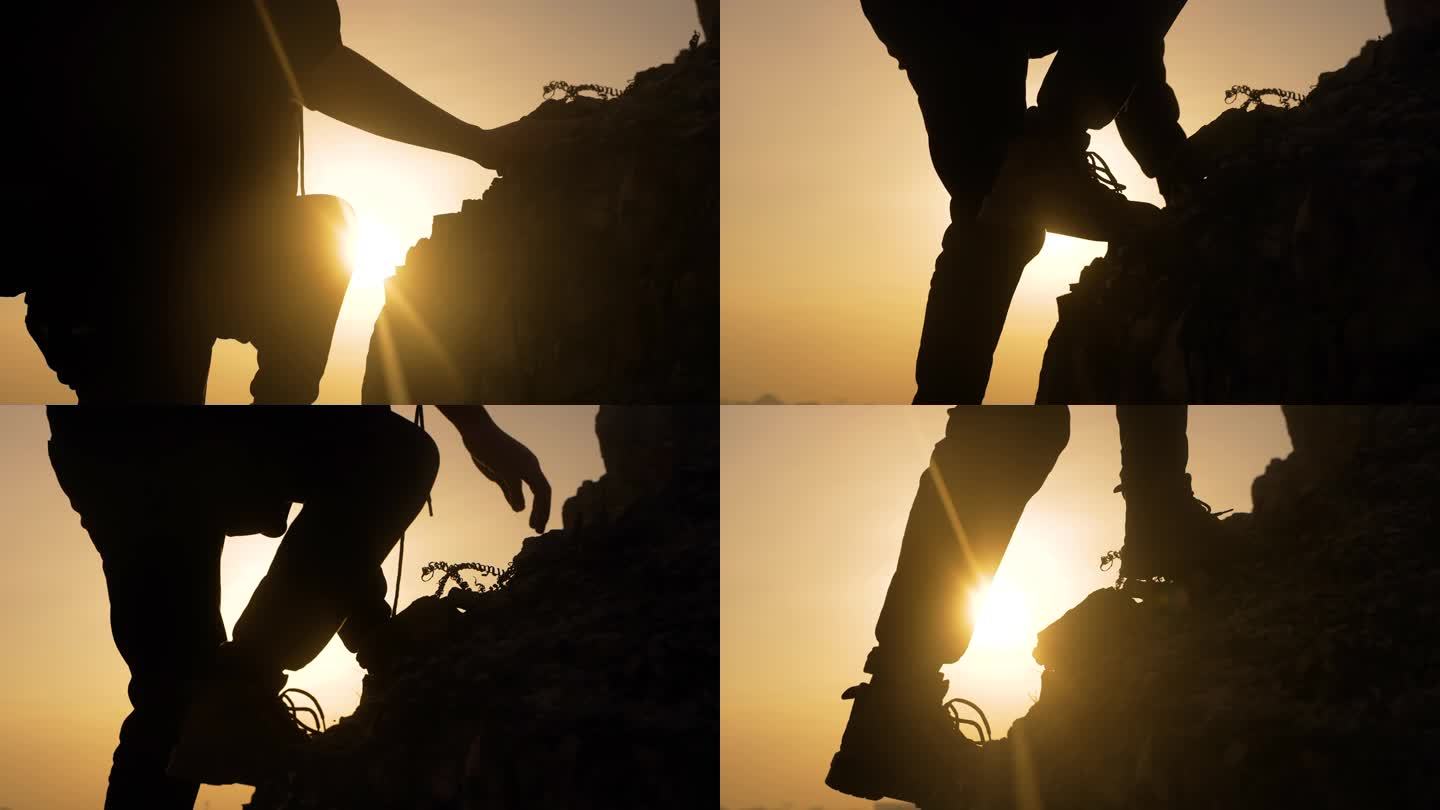 意境黄昏时分一名登山者正在攀登高峰探险家