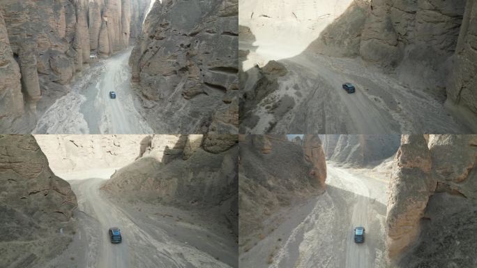 航拍行驶在黄河石林峡谷中的汽车